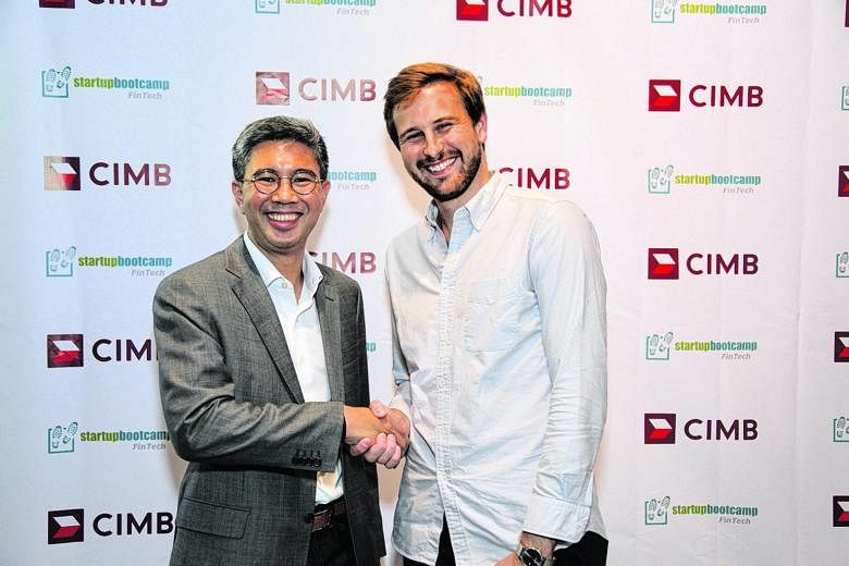 CIMB Group CEO Zafrul Aziz (below, left) with co-founder of Startupbootcamp FinTech Markus Gnirck. The bank is partnering the company to mentor start-ups.