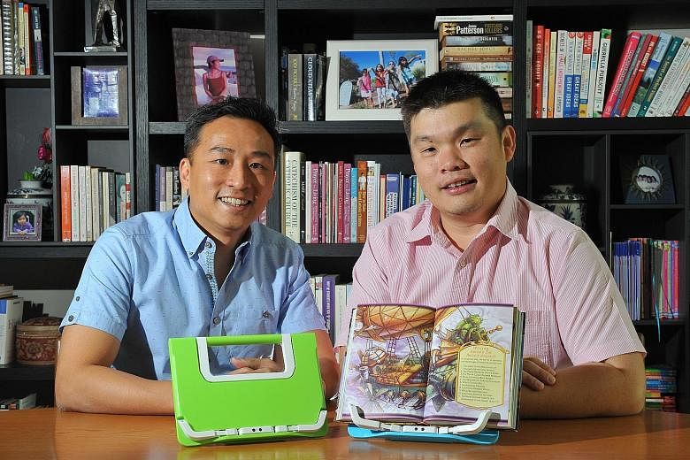 Mr Lee (left) and Mr Ng developed the BookBuddy after Mr Ng's daughter began showing signs of myopia. The gadget can help reinforce good reading habits, such as taking a break after half an hour.
