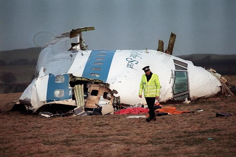A file picture taken in Lockerbie, Scotland, on Dec 22, 1988, shows the wreckage of the Pan Am Flight 103 aircraft that exploded, killing all 270 on board. Many details of the bombing remain unresolved.