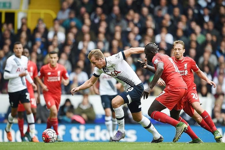 Tottenham's Harry Kane (left) vies for the ball with Liverpool's Mamadou Sakho during the 0-0 draw at White Hart Lane yesterday.