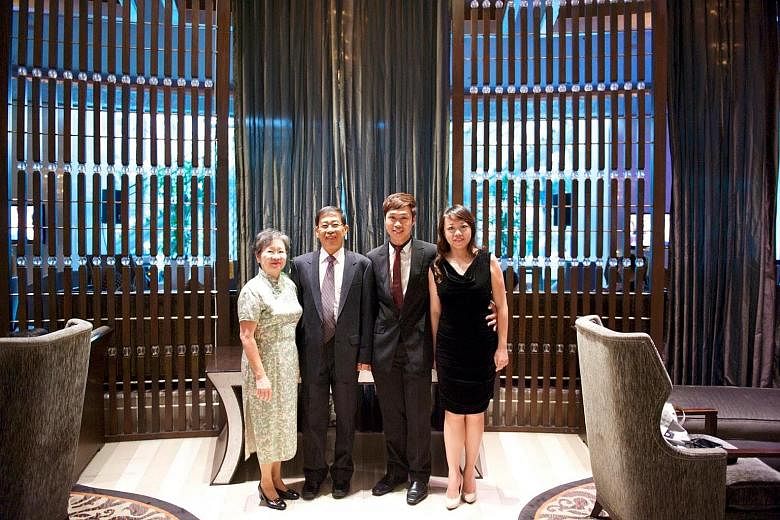 Forum contributor Phillip Tan Fong Lip with his wife Winnie, son Avin and daughter-in-law Arielle. Mr Tan says he writes to the Forum to hone his mental faculties.