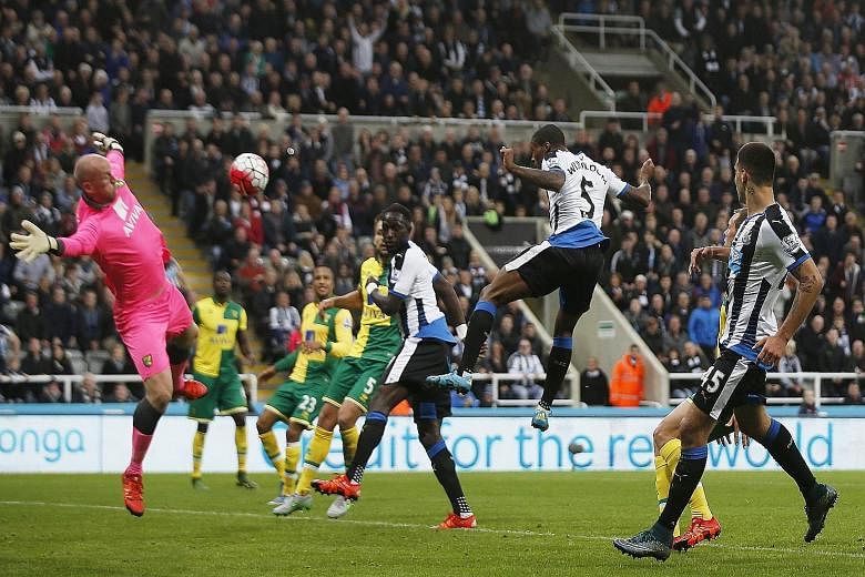 Georginio Wijnaldum scores the fifth goal for Newcastle, completing his hat-trickThe Magpies have climbed to 18th in the table following their 6-2 win over Norwich.