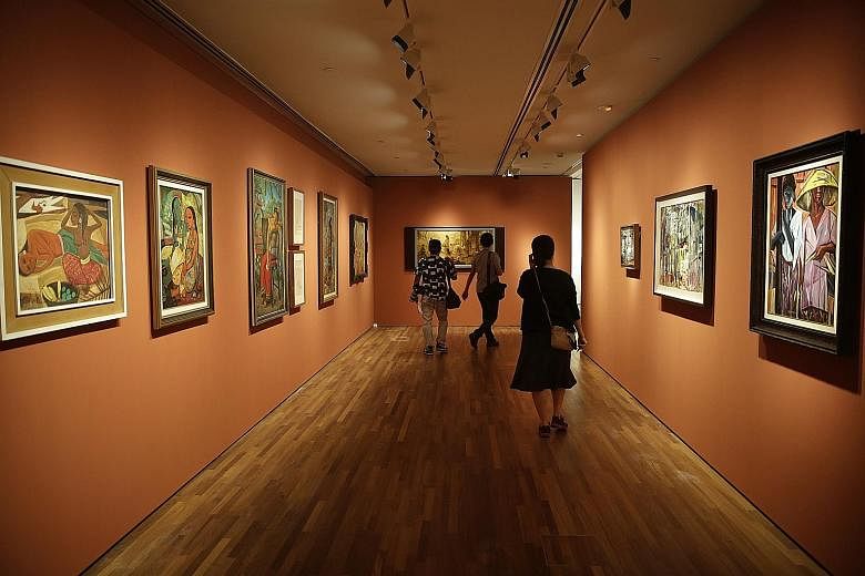 Paintings lining the walls at a section of the DBS Singapore Gallery 1, one of two permanent galleries in the National Gallery Singapore. From Nov 24, The National Gallery will feature a long-term exhibition of 19th- and 20th-century art collections 