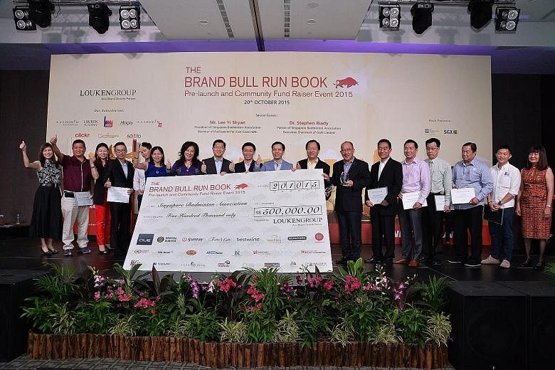 SBA president Lee Yi Shyan (third from right), Luke Lim, group chief executive officer of Louken Group (second from right) and some of the representatives of donor companies.
