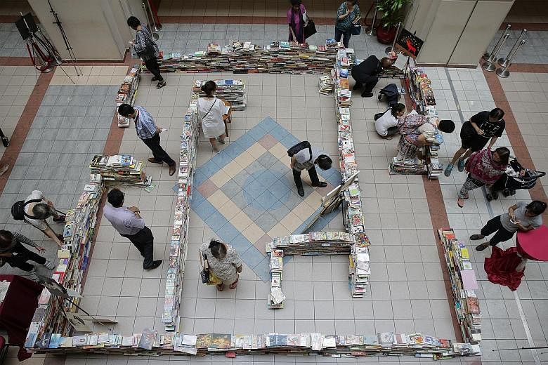 Visitors are drawn to Tan Tock Seng Hospital's art installation, A Book Maze (above), which is made up of 3,500 books of different genres. It is part of the hospital's Art of Healing programme that aims to use the arts to help patients relax. The boo