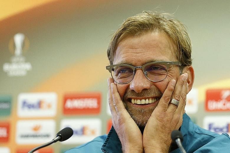 Liverpool manager Juergen Klopp during yesterday's press conference. Klopp's first home game in charge will be against Rubin Kazan in the Europa League.