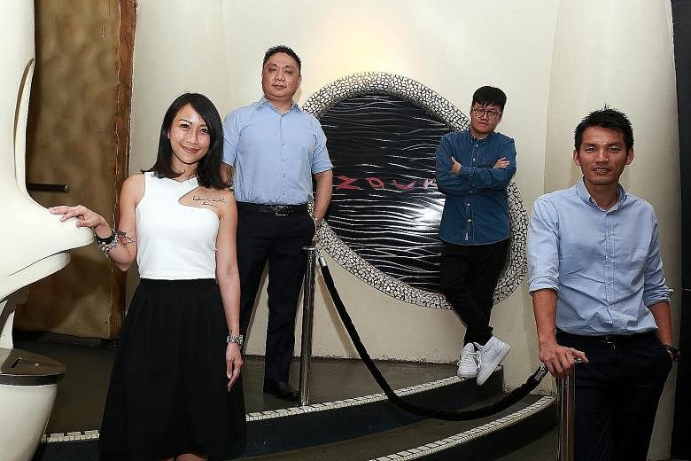 GHK's Mr Andrew Li (above) wants to assure Singaporeans that enough resources would be allocated to expand Zouk. He will be working closely with Zouk Singapore's core team - (from left to far left) Mr Benny Heng, Mr Wayne Lee, Mr Francis Lau and Ms S