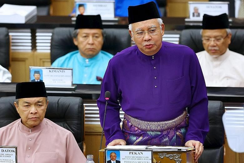 Mr Najib presenting the 2016 Budget in Parliament yesterday amid a tough economic backdrop.