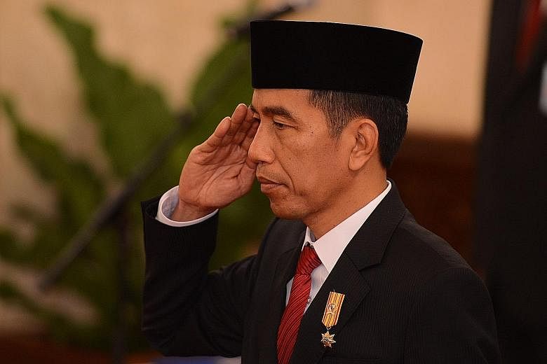 Indonesian President Joko Widodo attending a swearing-in ceremony for newly appointed ministers in Jakarta in August. He will begin his maiden visit to the US tomorrow.