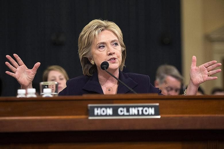 Mrs Clinton appearing before the House Select Committee on Benghazi on Thursday. Denying longstanding Republican allegations that she turned down requests to beef up security in Benghazi, she said: "I was not responsible for specific requests and sec