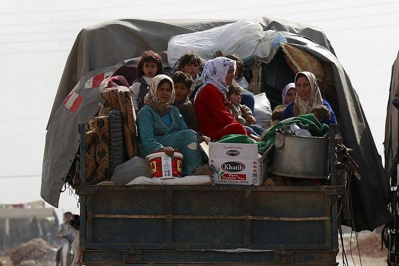 The growing refugee crisis - as tens of thousands of Syrians flee to Europe to escape the war zone - and Russia's military intervention have increased pressure on US President Barack Obama to take more forceful action in Syria.