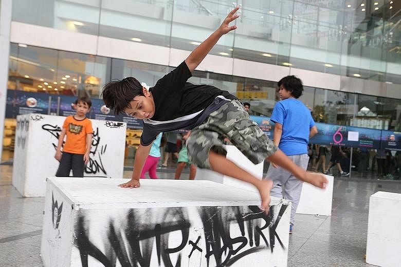 Amir Shah Hromatka, 10, at a parkour workshop by Superfly Monkey Dragons.