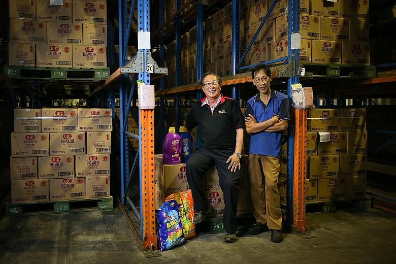 Brothers Lim Thiam Ting (left), 73, and Lim Siong San, 69, are long-serving employees at the UIC detergent factory, having worked there for the last 50 years. The elder Mr Lim started as a production worker but is now a storekeeper, while his brother