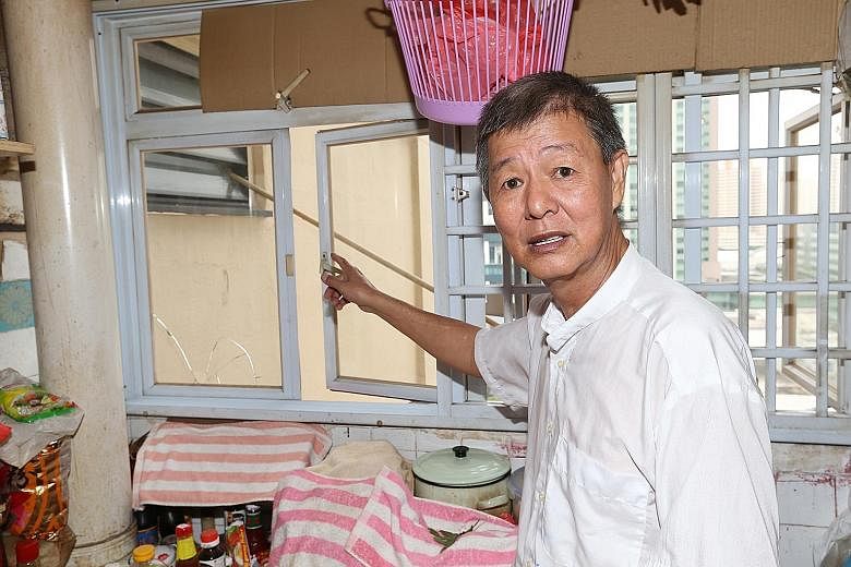 Retiree Yeo Boon Kwee has had his windows broken by his neighbours' falling bamboo poles twice. Others who live in the same HDB block as Mr Yeo also reported that poles could be dislodged by strong winds.