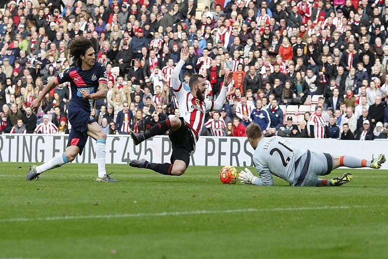 Sunderland's Steven Fletcher (right) being blocked in the penalty box by Fabricio Coloccini - resulting in a penalty and the Newcastle defender being sent off. The referee's decision appeared rather harsh.