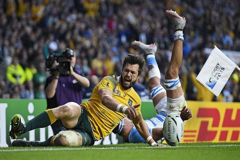 Australia's Adam Ashley-Cooper celebrates scoring a try against Argentina. The Wallabies will face tournament favourites the All Blacks, who beat the Springboks 20-18, in the Rugby World Cup final on Saturday.