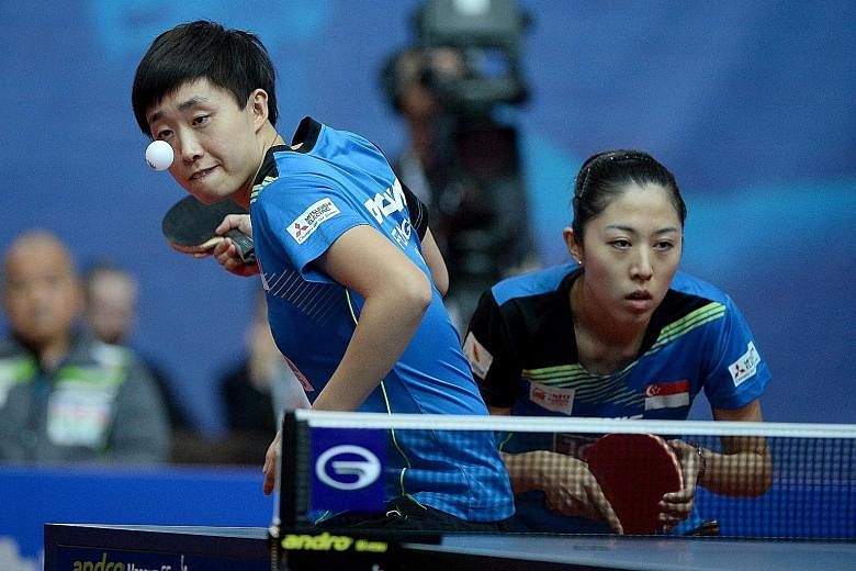 Feng Tianwei (left) and Yu Mengyu lost badly to China's Ding Ning and Zhu Yuling in their ITTF Polish Open women's doubles final after a disagreement between Yu and head coach Jing Junhong.