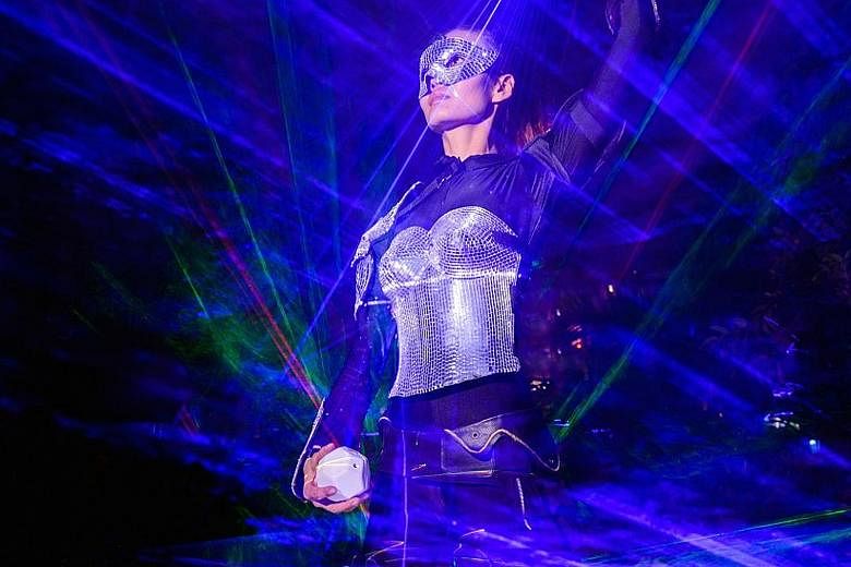 (From left) Dancers in futuristic outfits and celebrity Guos such as popular TV host Guo Liang and local singer Guo Mei Mei will be at Singapore Fen Yang Guo Association's dinner.