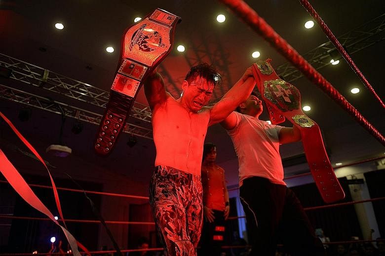 At the end of Prove 5, The Statement (Andruew Tang) is declared the new South-east Asian Championship winner and is presented with the title belt (right) while he holds his Hong Kong Championship belt (left) which he won last year.