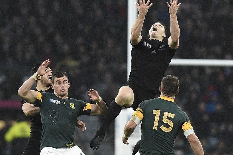The All Blacks' Ben Smith jumping for the ball in the World Cup semi-finals.