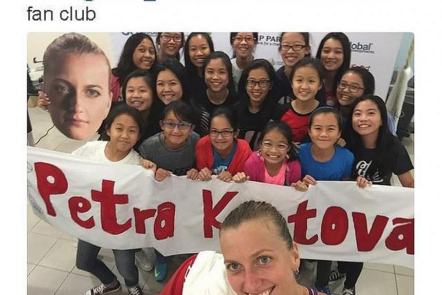 Can the real Petra Kvitova please stand up? The Czech world No. 5 with some fans following her win over Lucie Safarova yesterday.