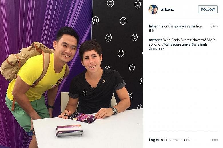 "With Carla Suarez Navarro! She's so kind!" A lucky fan got to meet the Spaniard, here to play doubles, at the Fan Zone yesterday.
