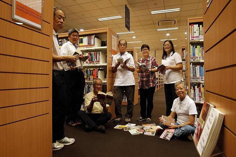 Adviser to the Taxi Sifu Reading Club Kiang-Koh Lai Lin (fifth from left) with some members of the club's executive committee, (from far left) Mr Wong Yew Kong, Mr Ng Chohe Kheng, chairman Tan Seng Lee, secretary Seng Say Lee, Ms Lim Yueh May and Mad