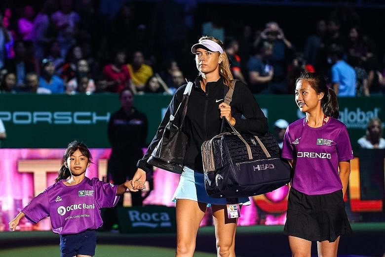 Six-year-old Samantha Mikaella is one of the player mascots at the WTA Finals in Singapore this week, where she had a chance to walk out with Maria Sharapova on Tuesday.