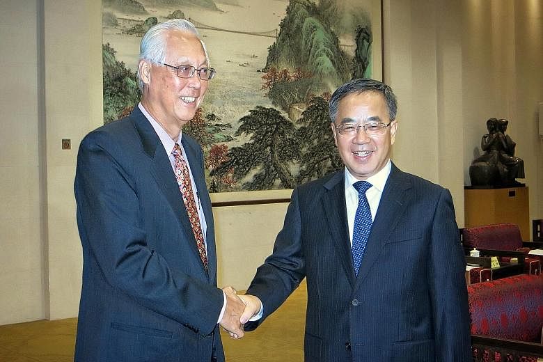 Emeritus Senior Minister Goh Chok Tong had a meeting with Guangdong Party Secretary Hu Chunhua while attending the 21st Century Maritime Silk Road International Expo Forum in Guangzhou, China. Both leaders expressed satisfaction with the development 