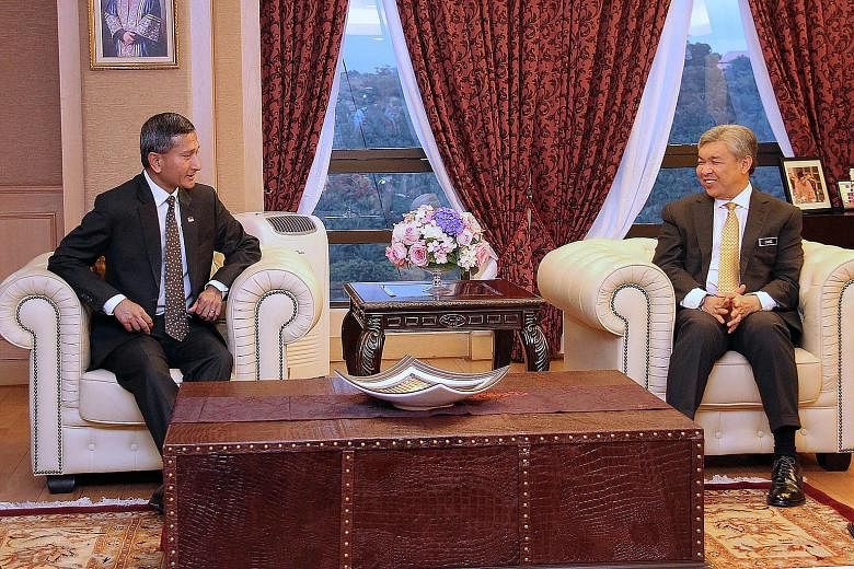 Singapore Minister for Foreign Affairs Vivian Balakrishnan (left) yesterday called on Malaysian Deputy Prime Minister Ahmad Zahid Hamidi in Kuala Lumpur during a two-day introductory visit to Malaysia, and reaffirmed the excellent ties between the tw