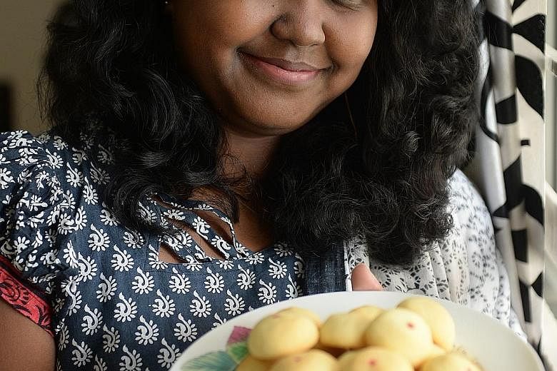 As her mother lived in Tamil Nadu, Ms Catherine Ruth had to jot down her recipes - from curries to cookies to thosai - via phone conversations with her.