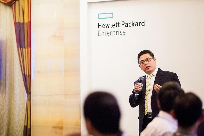 At the tech firm's Alexandra Road office, a new HPE logo has gone up; it is a green box signifying a window of future opportunities. The old logo with a blue background is retained by HP Inc.