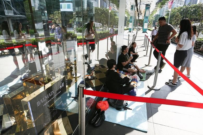 The queue outside H&M's Orchard Building outlet started to form at about 7pm on Monday.