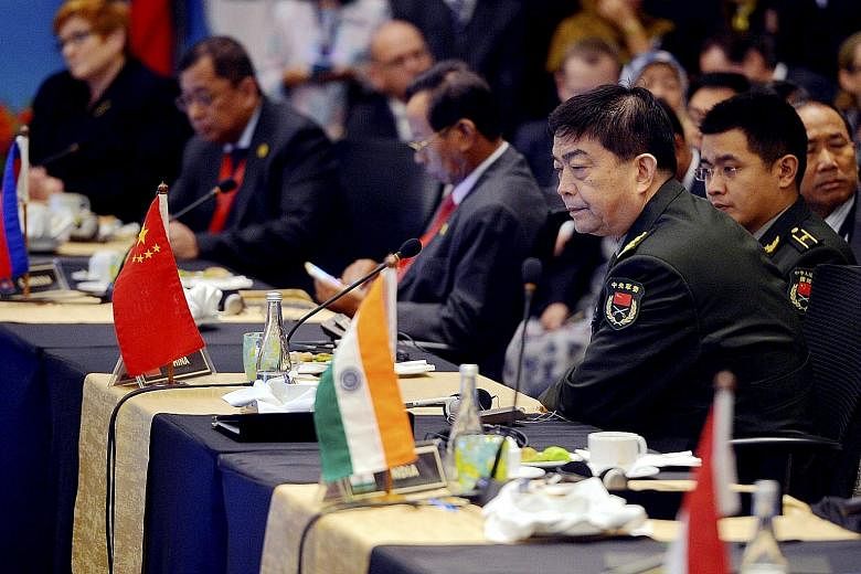 Chinese Defence Minister Chang Wanquan at the Asean Defence Ministers' Meeting-Plus meet in Subang, Malaysia, yesterday. In response to US activity in the South China Sea, the minister said the issue of freedom of navigation should not be "hyped up" 