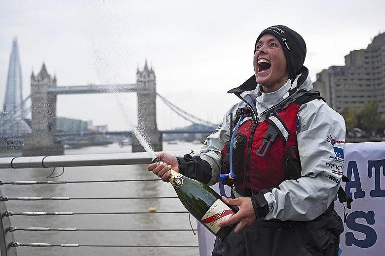 British adventurer Sarah Outen celebrating the completion of her London2London: via the World expedition on Tuesday.