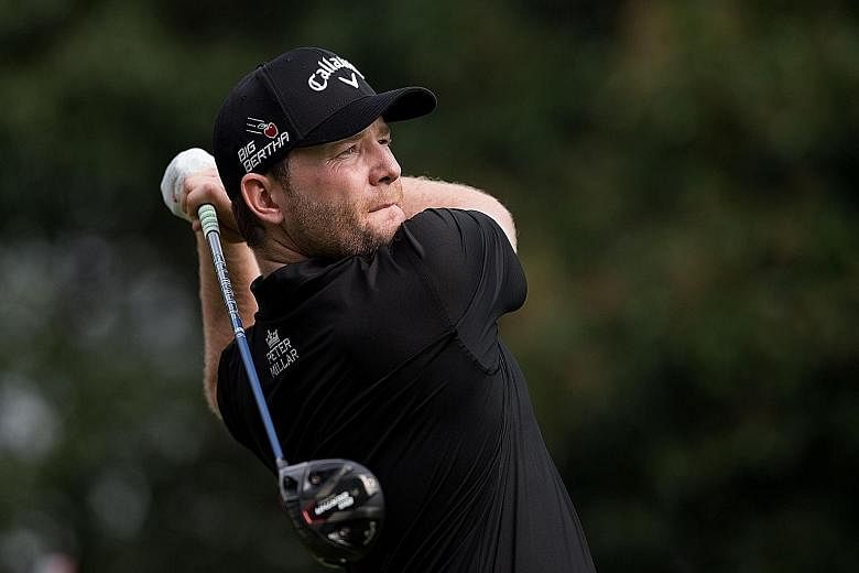 South African Branden Grace teeing off during his superb bogey-free first round, in which he enjoyed nine birdies.