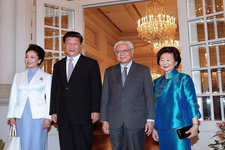 (From far left) Madam Peng Liyuan, Chinese President Xi Jinping, President Tony Tan Keng Yam and Mrs Mary Tan at the Istana yesterday. Mr Xi arrived yesterday for a two-day state visit to mark 25 years of diplomatic relations between China and Singap
