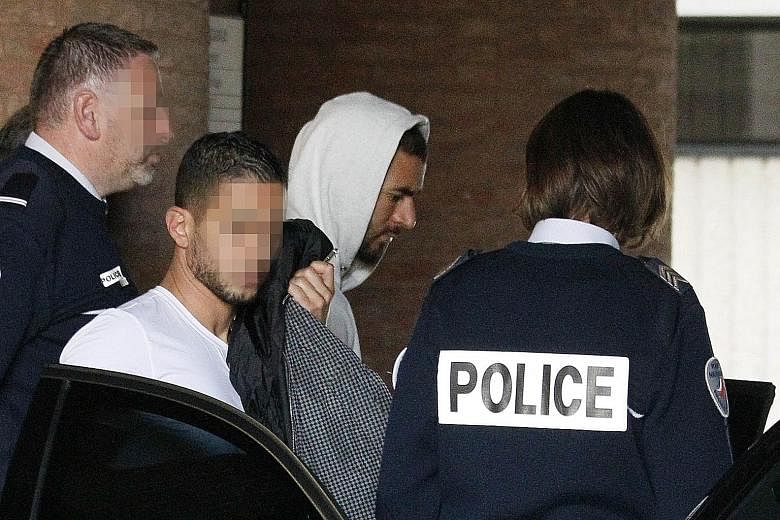 Karim Benzema leaving the courthouse in Versailles on Thursday. French police are looking into whether the France international striker played a part in an alleged bid to extort money from Lyon player Mathieu Valbuena. Benzema has been left out of tw