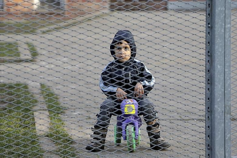 A migrant child in a foreigner detention facility in the Czech Republic. The UN estimates that there are three million stateless children globally and 70,000 are born annually. In some countries, they are not entitled to government-run immunisation p