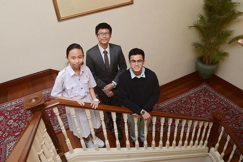 Among beneficiaries of The Straits Times School Pocket Money Fund are (from left) Chung Cheng High School (Yishun) student Lim Jia Qi, 13; Temasek Polytechnic student Malcom Lau, 18; and Millennia Institute student Indra Putra Kamsan, 18.