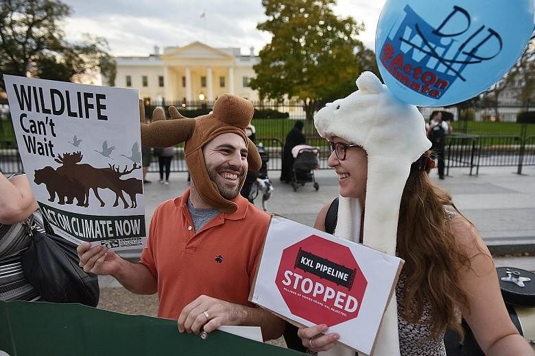 Demonstrators in front of the White House celebrating the rejection of the Keystone XL oil pipeline last Friday. The project had become a political symbol amid clashes over energy, climate change and the economy.