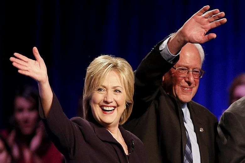 Democratic presidential candidates Hillary Clinton and Bernie Sanders at a forum in South Carolina on Friday. According to the RealClearPolitics website, Ms Clinton has the support of 54.8 per cent of Democratic voters while Mr Sanders is backed by 3