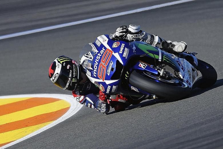 Yamaha rider Jorge Lorenzo topping qualifying at the Valencia Grand Prix yesterday. The Spaniard, who trails Valentino Rossi by seven points in the standings, can claim his third MotoGP world championship.