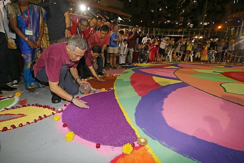 About 5,000 people took part in the first Orange Ribbon Run, themed the Race Against Racism, in 2013. It was organised by OnePeople.sg, a body that promotes racial harmony. Chinese New Year is a neighbourly affair (above) for these Sembawang resident