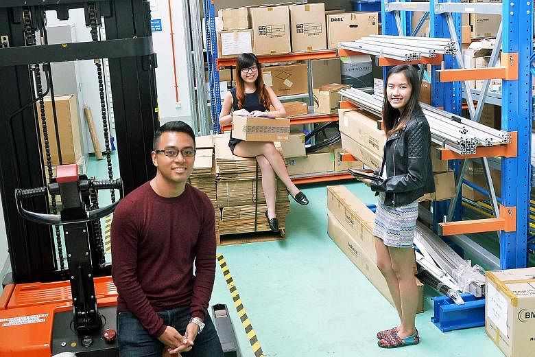 (From left): Mr Muhammad Nazmi Mohamed Zaaini, 23, Ms Tan Li Qi and Ms Brenda Cheng Bifeng, both 21, are part of the first batch of polytechnic graduates in the SkillsFuture Earn and Learn logistics programme. The 12-month programme, which sees participan