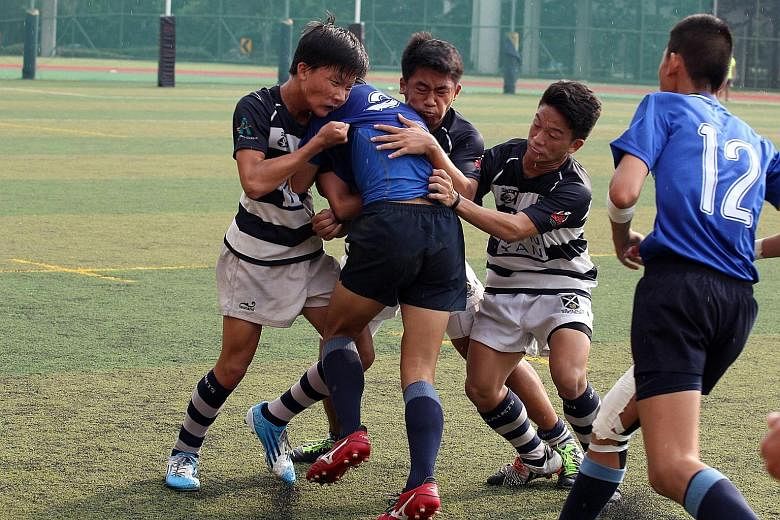 Thailand's Vajiravudh College were the big winners in the Saints Sevens Rugby Tournament yesterday, winning the Under-16 and U-18 Cup competitions. They also finished runners-up in the U-14 event, losing 0-12 to St Andrews Team A (above). The annual 