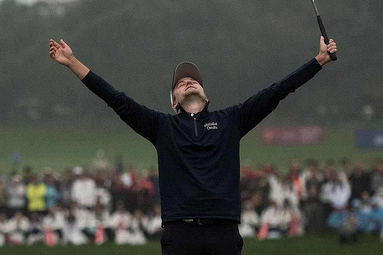 Russell Knox savouring the moment after his two-shot win over Kevin Kisner in the WGC-HSBC Champions. Englishmen Danny Willett and Ross Fisher were joint third a further stroke back.