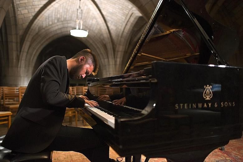 Pianist Conrad Tao (left) playing in a crypt under the Church of the Intercession in New York.