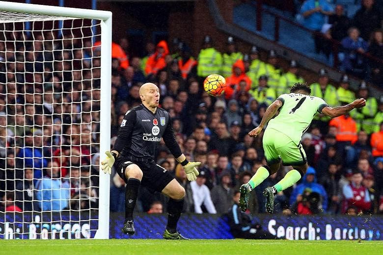 With no recognised striker, Manchester City drew 0-0 at Aston Villa on Sunday. Raheem Sterling (right) was guilty of missing this good chance, a close-range header that hit goalie Brad Guzan's face.