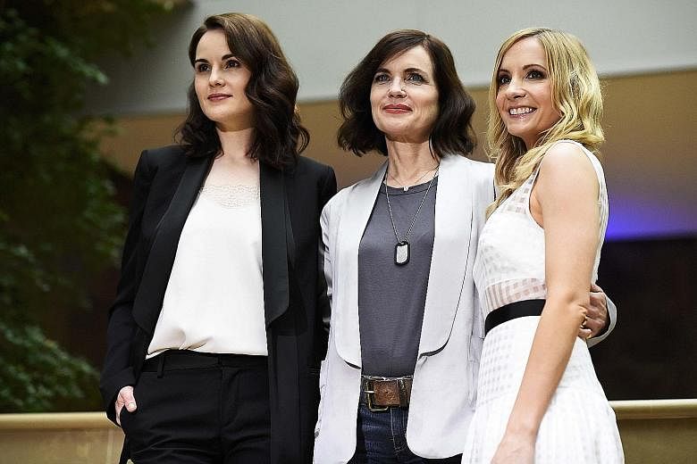 Downton Abbey cast members (from left) Michelle Dockery, Elizabeth McGovern and Joanne Froggatt at a London event for the TV series in August.